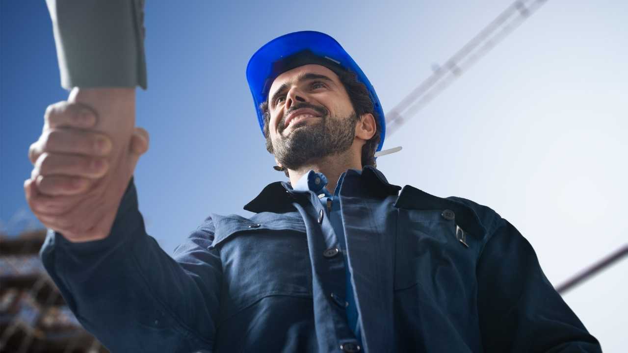 man shaking hand (Blog H1 - How To Win Subcontractor Jobs)